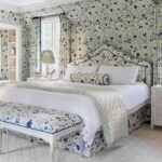 patterned drenched blue and white bedroom