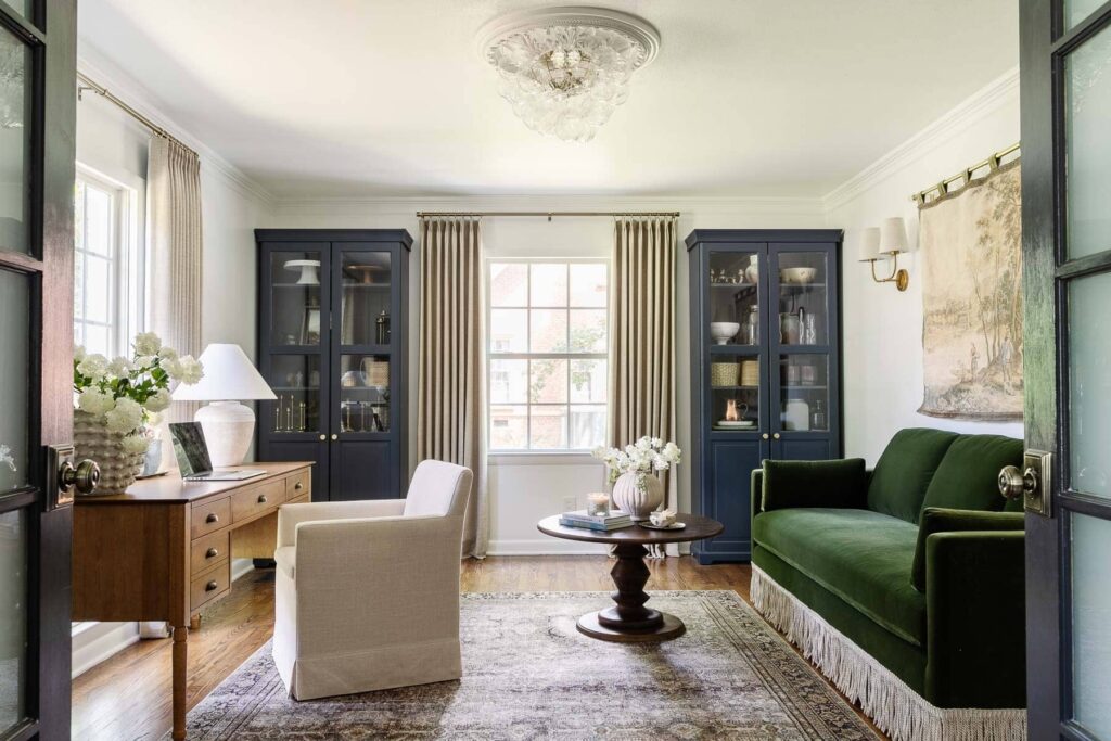 home office with navy sideboards for storage