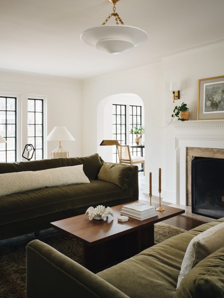 Dark green couches in the living room