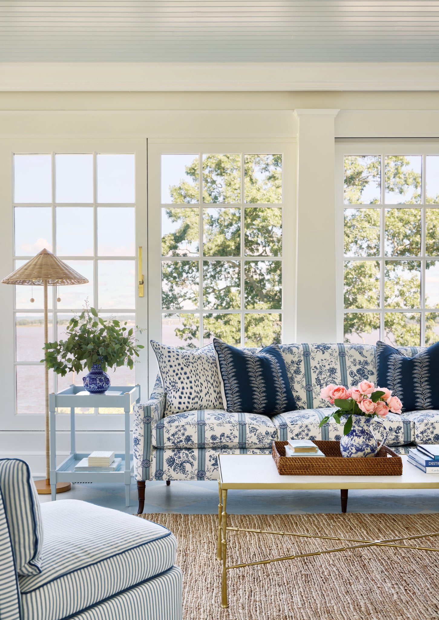 Blue floral upholstered couch in sitting room
