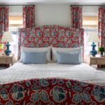 red and pale blue floral bedroom