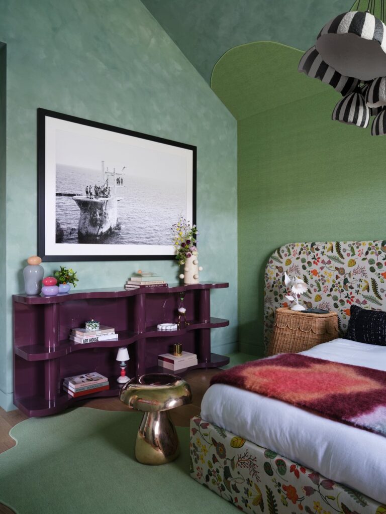 Green color drenching bedroom