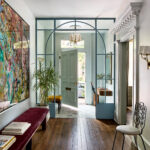 mint green door in a charming vestible