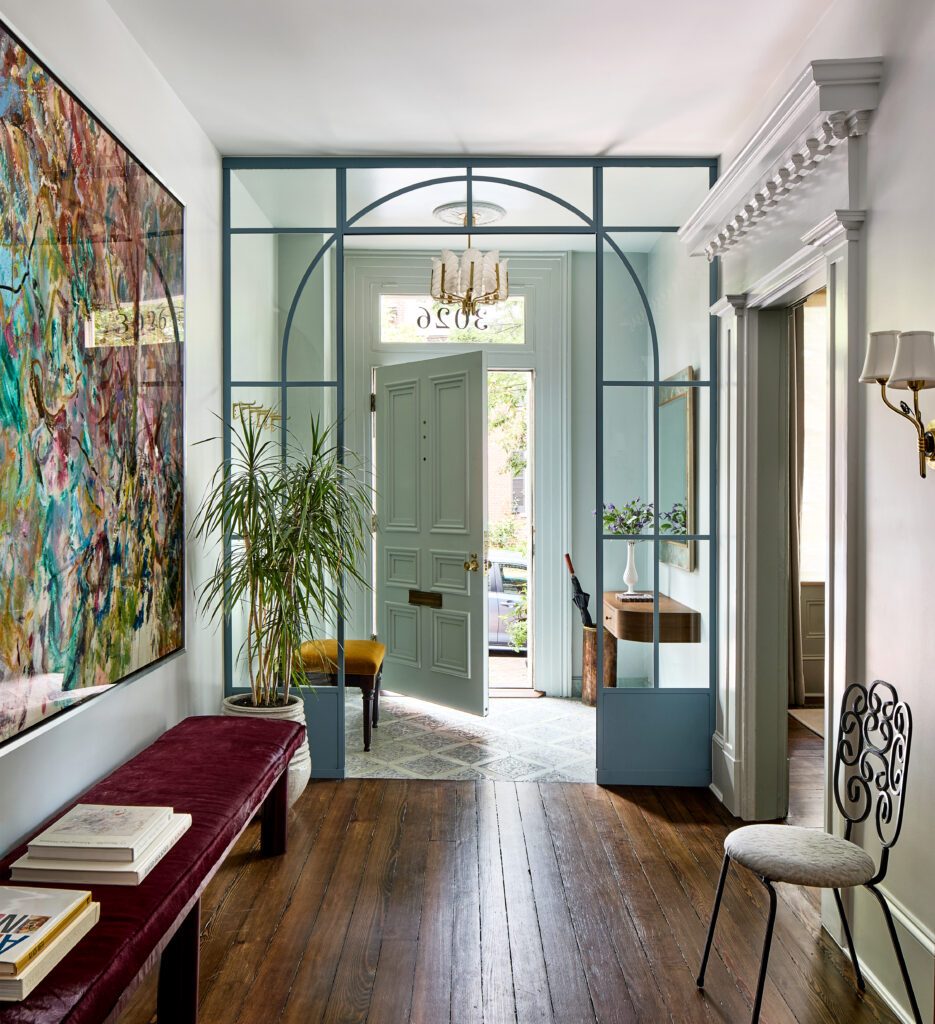 mint green door in a charming vestible