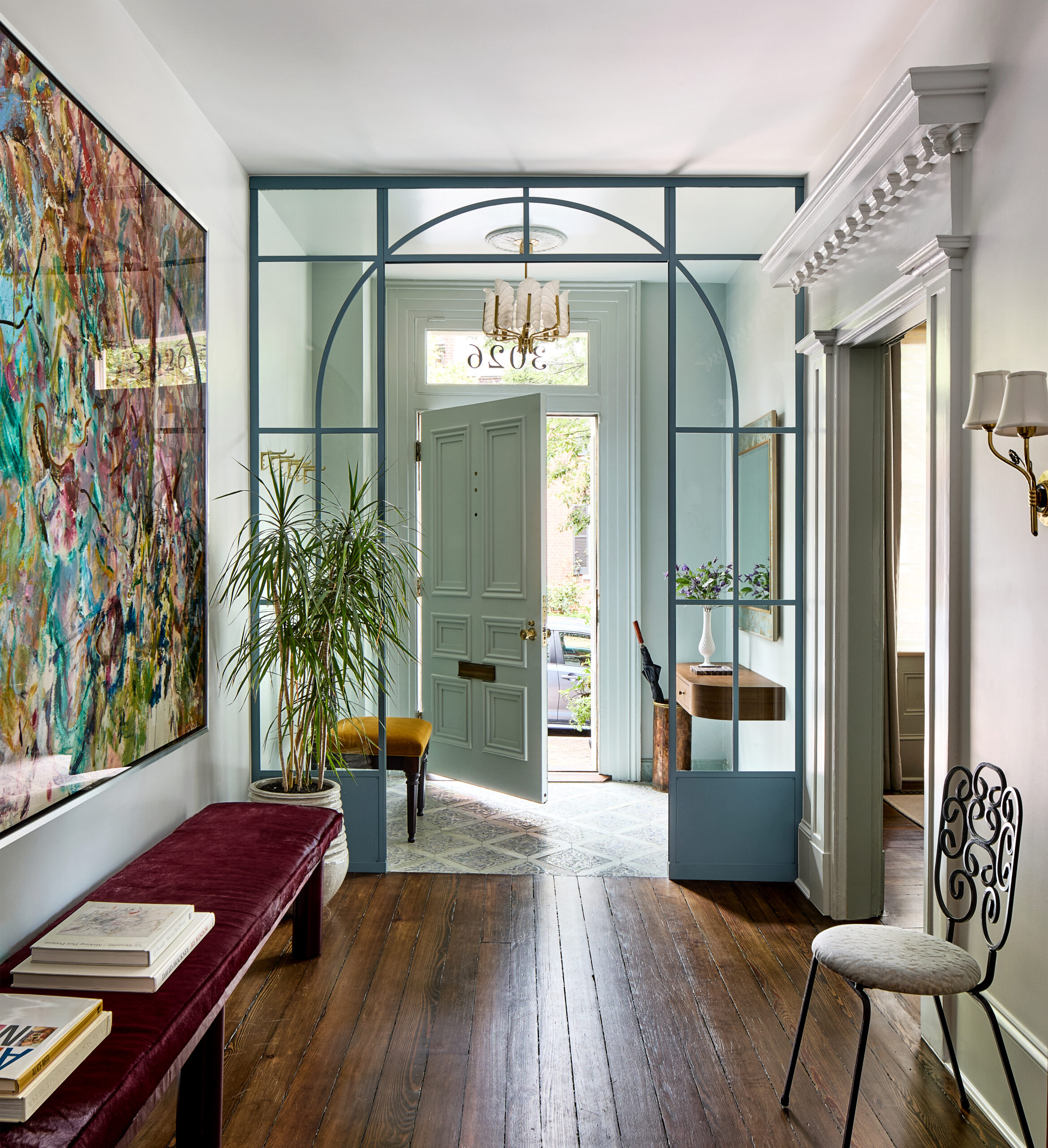 mint green door in a charming vestible