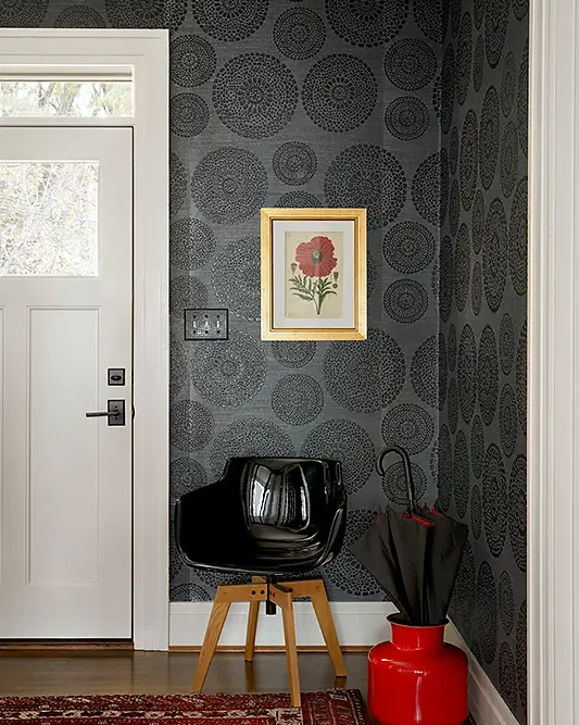 dark gray wallpapered entryway