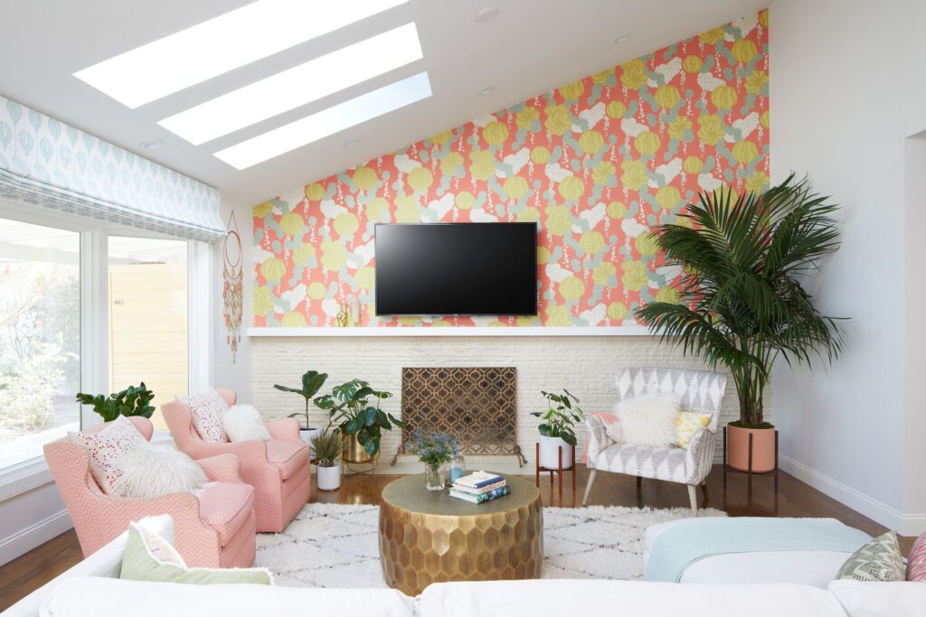 poppy wallpaper behind a mounted tv in living room