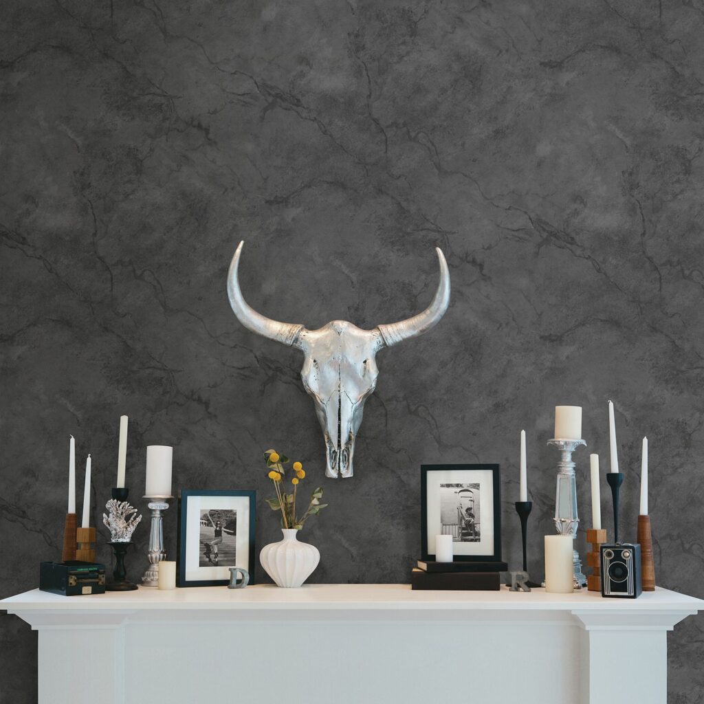 marbled gray wallpaper in front of a entry table