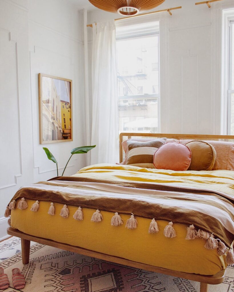 mustard yellow and cognac bedroom