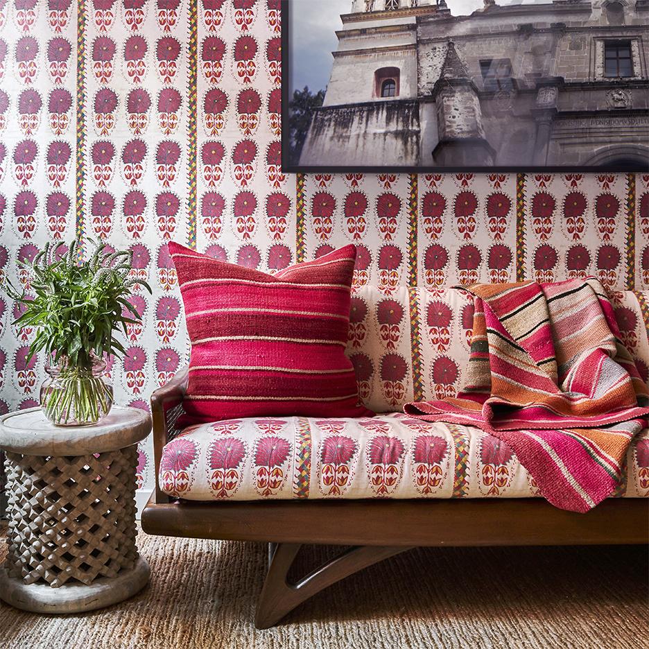 fuchsia daisy wallpaper and matching couch upholstery
