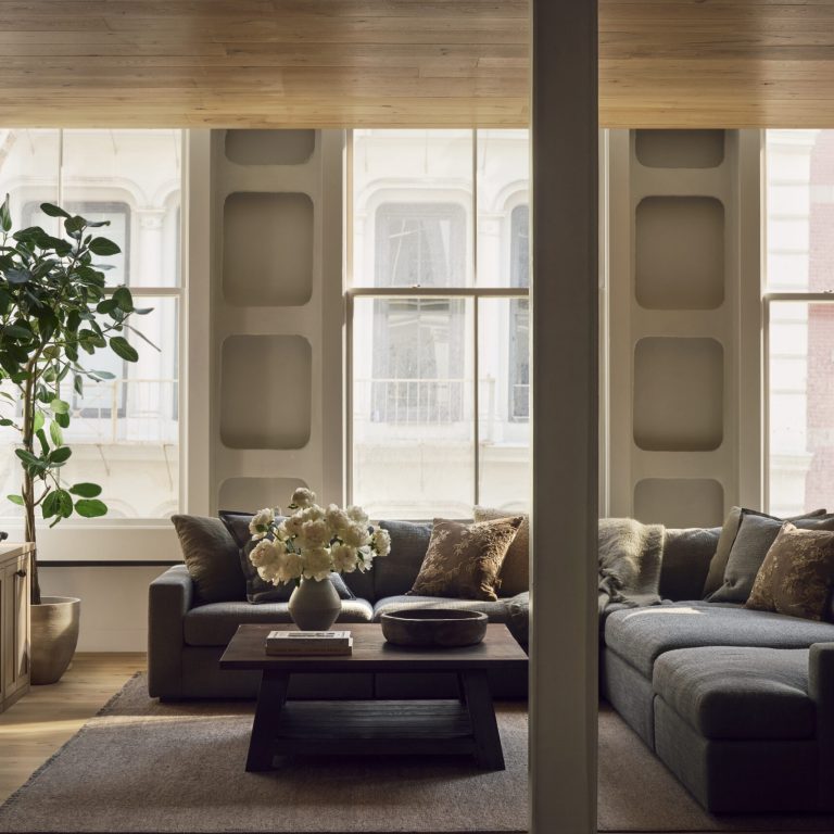Comfortable living room with large windows