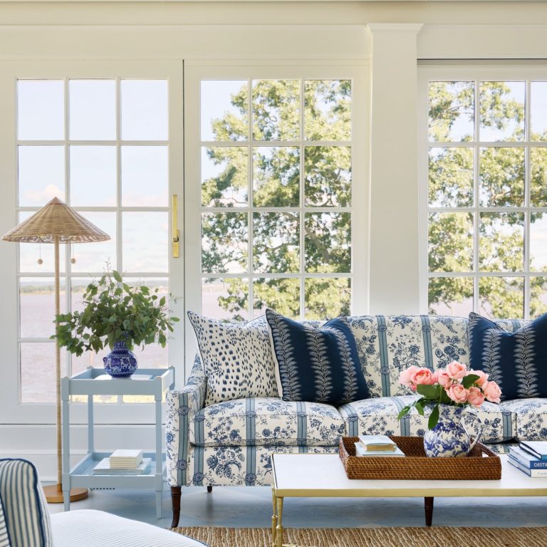 Blue floral upholstered couch in sitting room