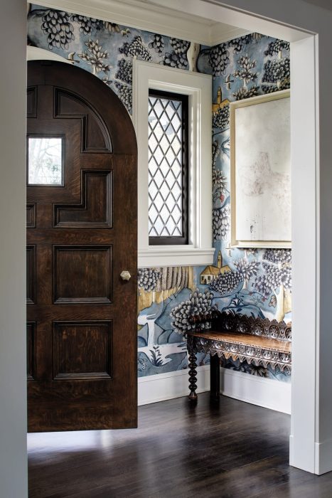 blue floral wallpaper and hardwood floor vestibule