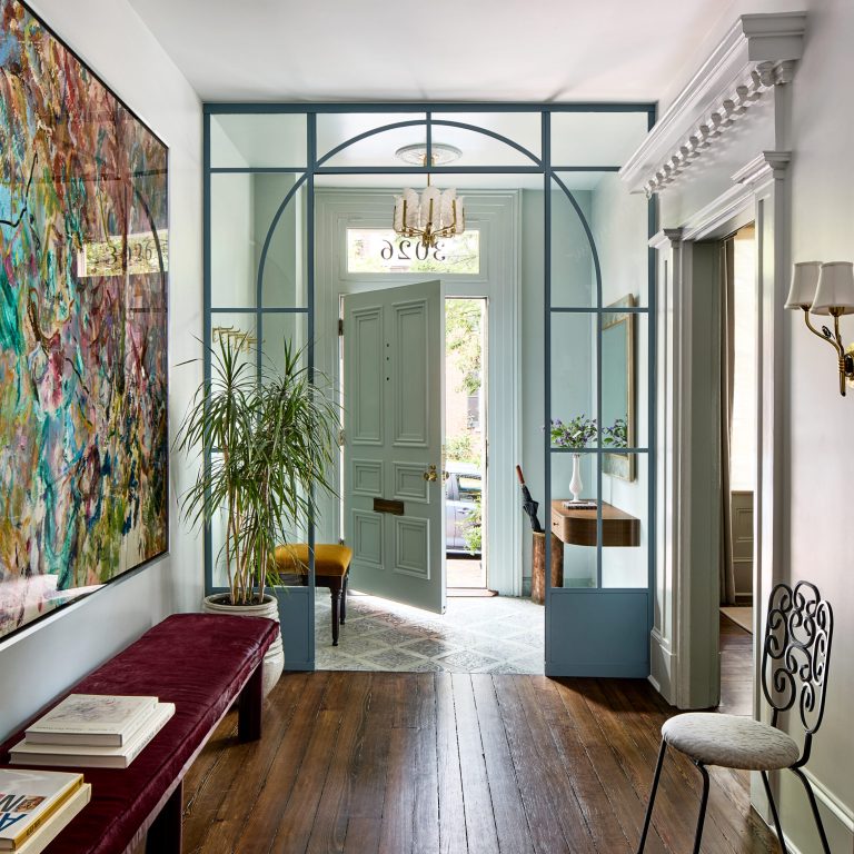 mint green door in a charming vestible