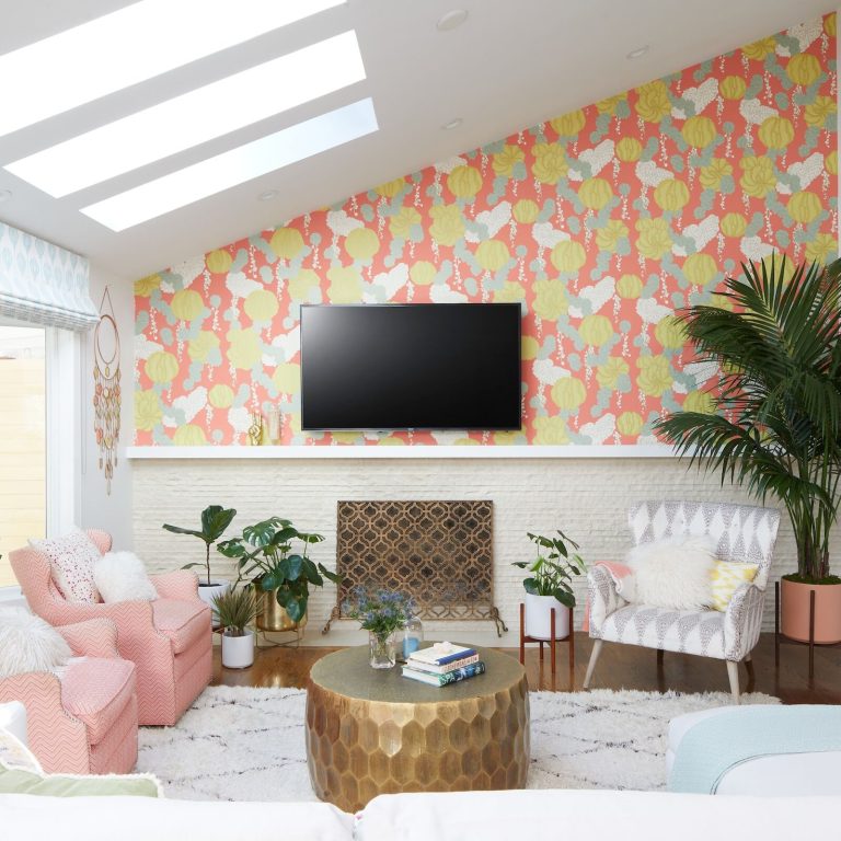 poppy wallpaper behind a mounted tv in living room